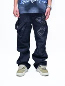 DIVINE EDGE – CROSS-STITCHED BLACK DENIM