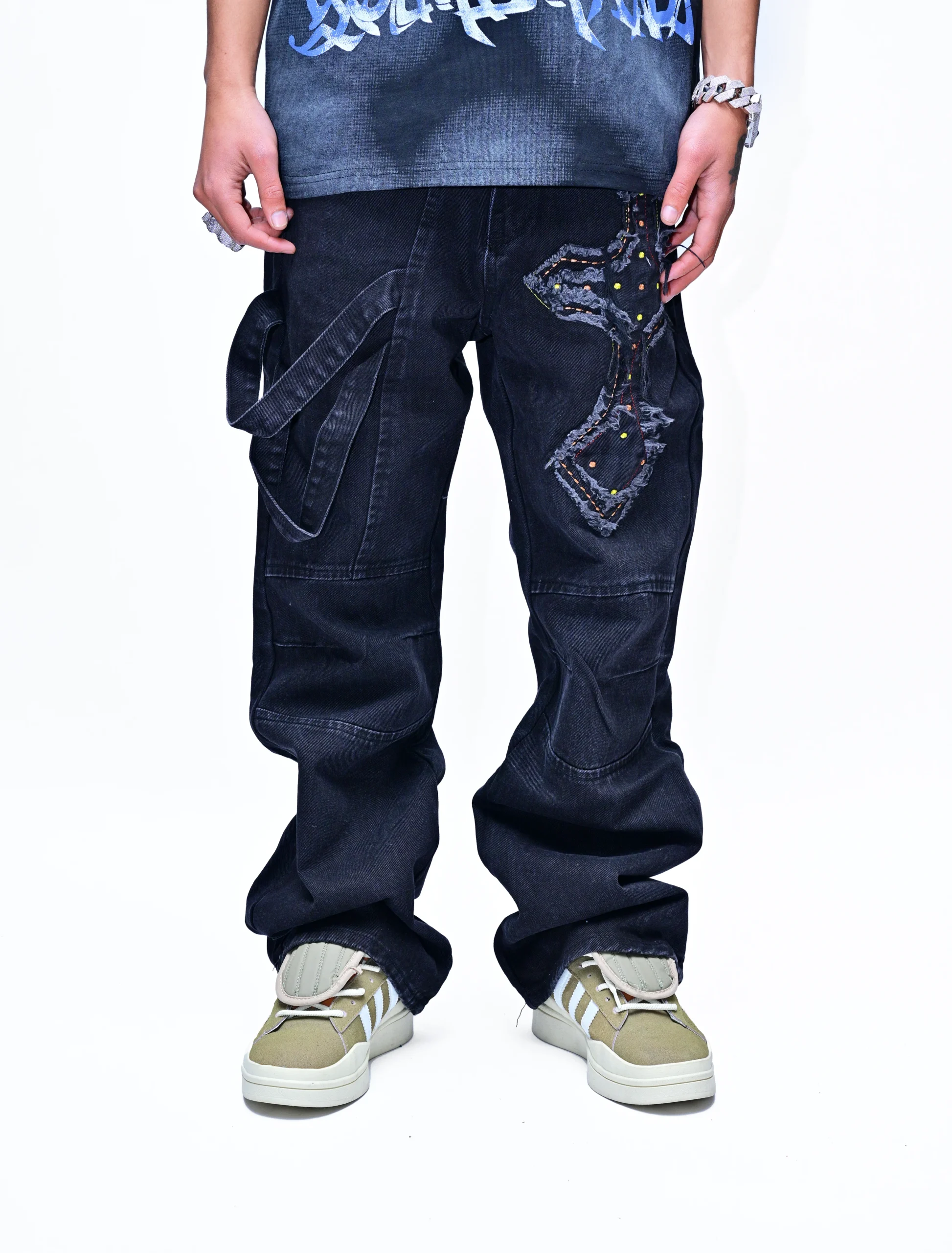 DIVINE EDGE – CROSS-STITCHED BLACK DENIM